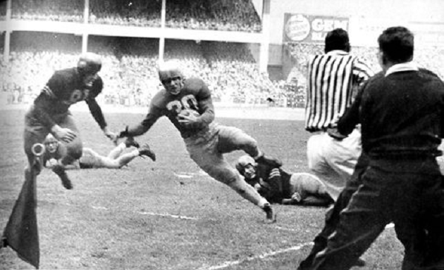 Captured in the picture above is the pivotal moment of 1946's "Game of the Century" when Notre Dame's Bill Gompers daringly dashed around the corner on 4th down, the goal line tantalizingly within reach. 