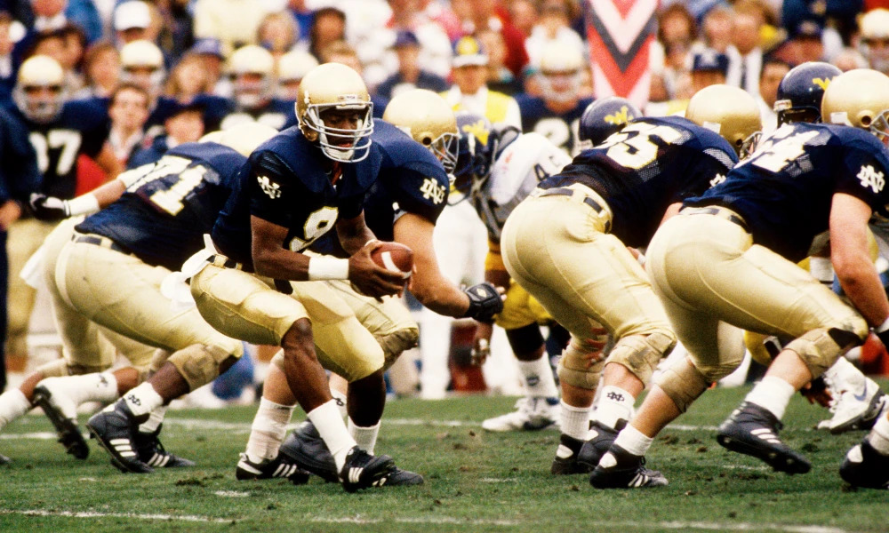 Tony Rice was the starting quarterback for the 1988 National Championship winning Fighting Irish. Rice was known for his agility and elusiveness, and he proved to be a true dual threat with his ability to both throw and run the ball.